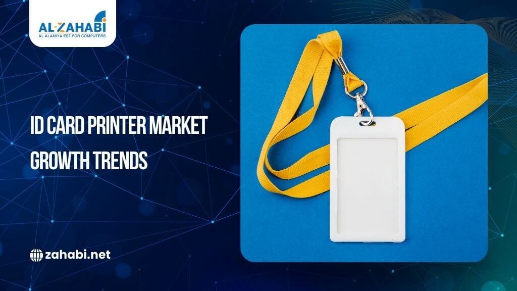 Close-up of an ID card printer producing badges with an upward market chart overlay.